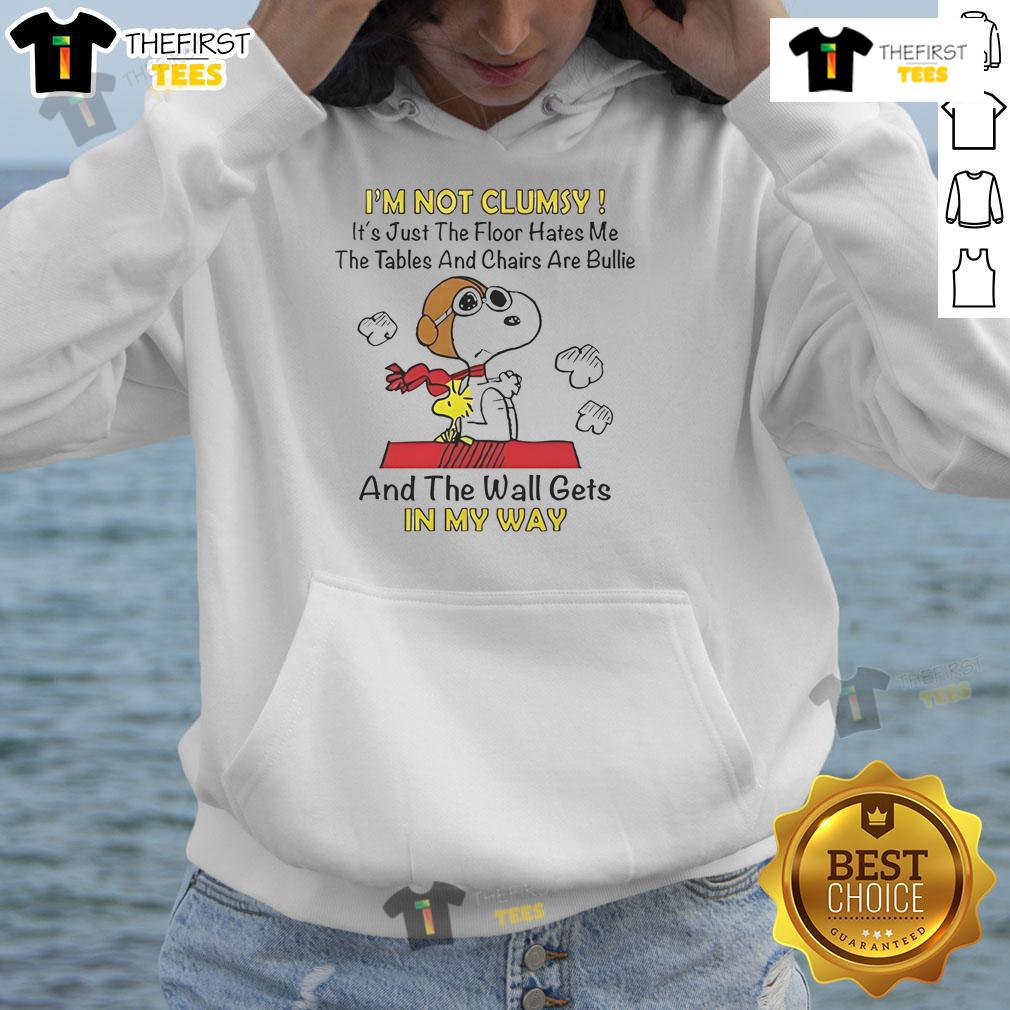 Good Snoopy and Woodstock hoodie featuring the quote 'I'm not clumsy, it's just the floor hates me' in playful design.