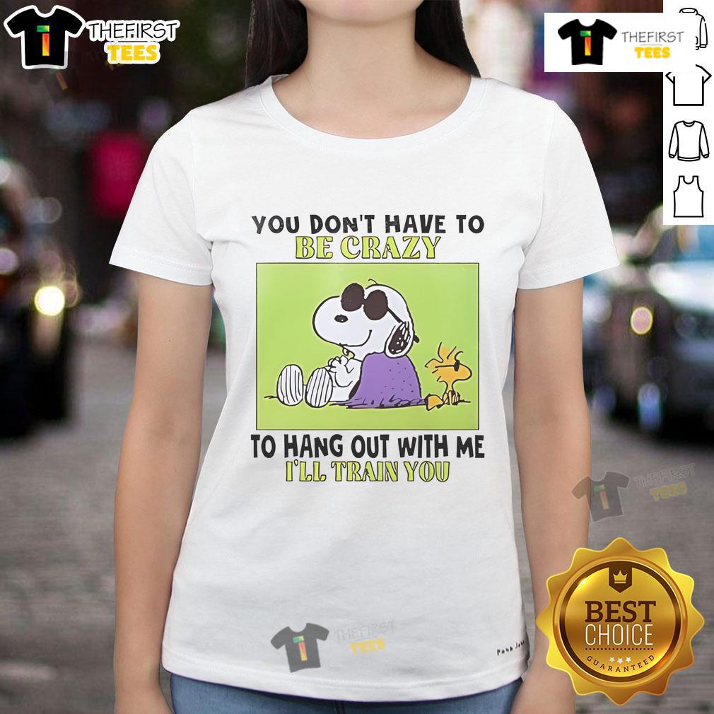 Alt Text: Good Snoopy and Woodstock tee featuring 'You Don't Have to Be Crazy to Hang Out with Me, I'll Train You' design.