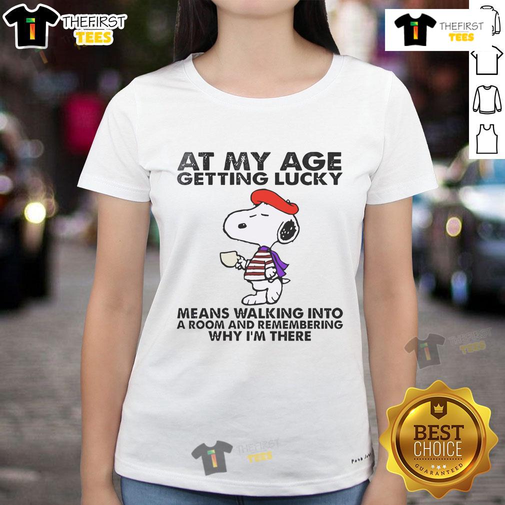 Good Snoopy tee for women: 'Getting Lucky Means Walking Into a Room and Remembering Ladies' graphic shirt design.