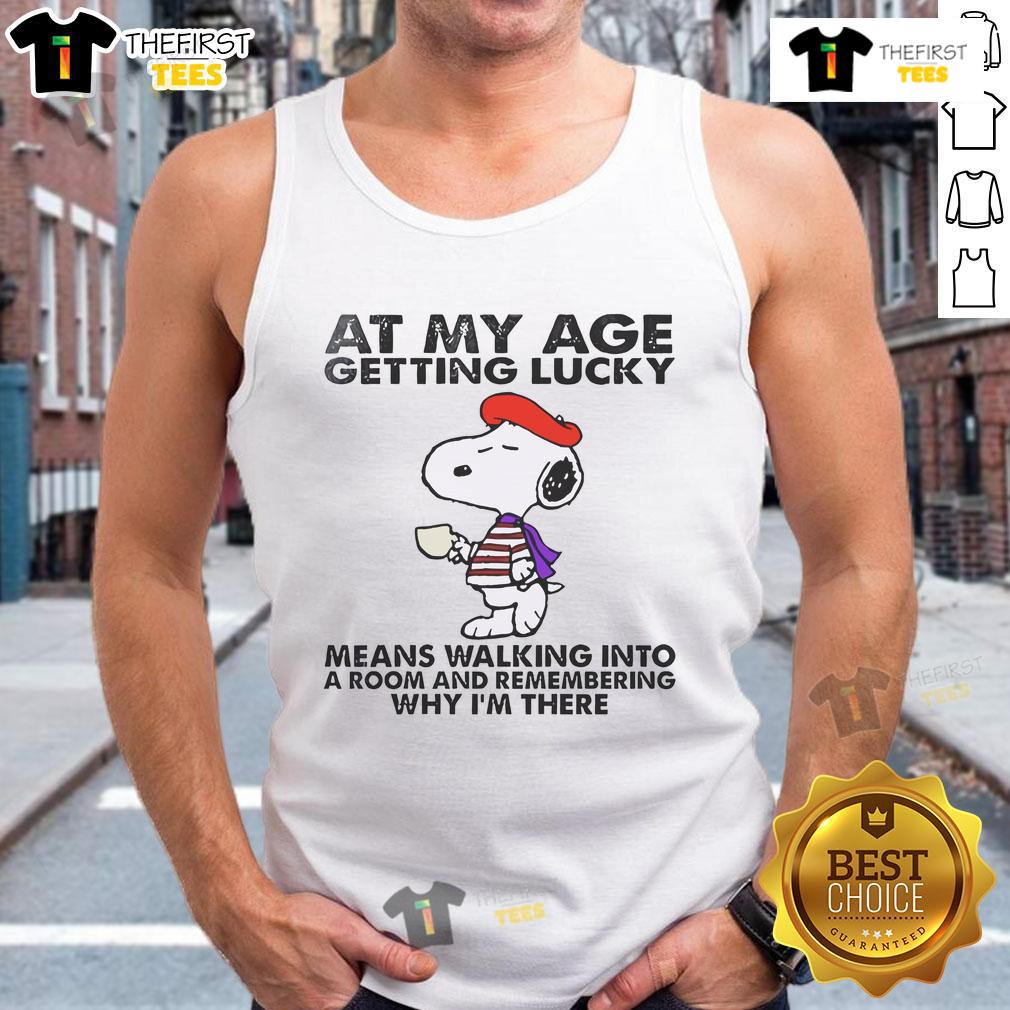 Snoopy cartoon with a humorous quote about aging, wearing a tank top, capturing the essence of 'getting lucky' at my age.