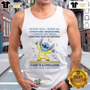 Alt Text: Woman wearing 'I'm Not Old, I Woke Up, I Lifted My Arms' tank top, showcasing a fun and humorous design.