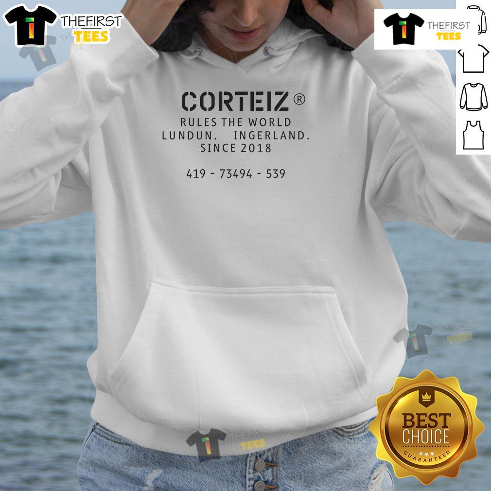 Alt Text: Official Corteiz Rules the World Lundun Hoodie in stylish black with bold graphic design, perfect for streetwear fashion.