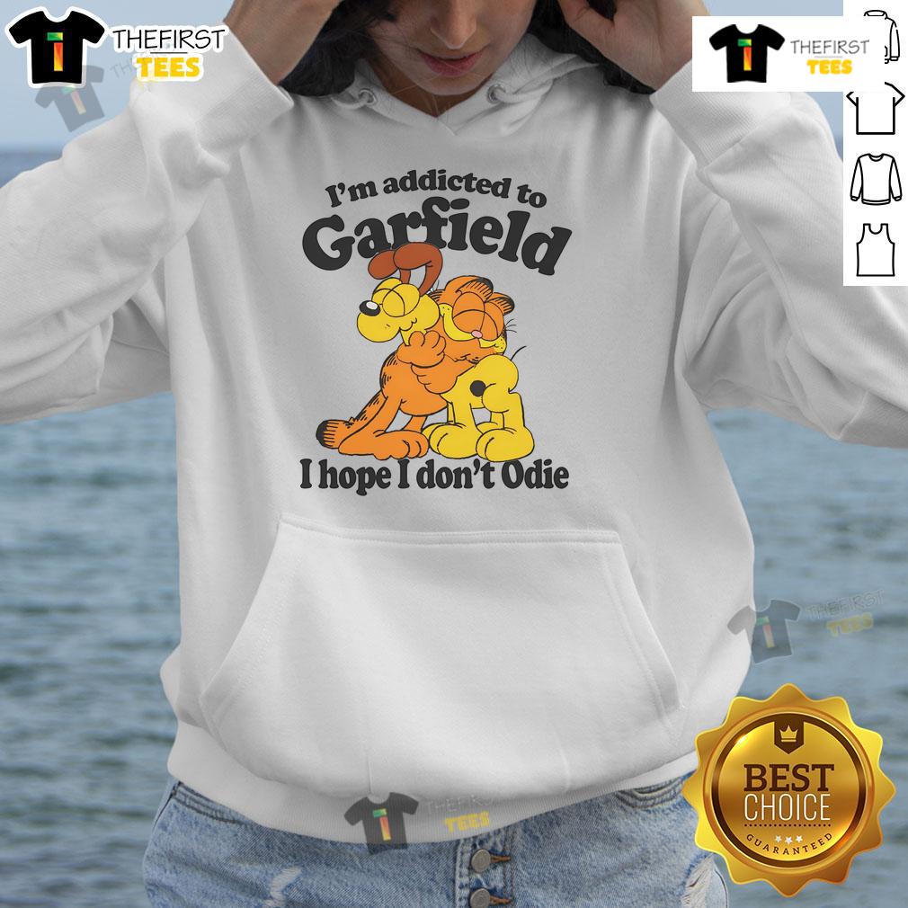 Cozy 'Official I'm Addicted to Orange Cat, Hope I Don't Odie' hoodie featuring a playful orange cat design.