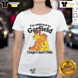 Official 'I'm Addicted to Orange Cats' ladies tee featuring a playful design with a cute orange cat illustration.
