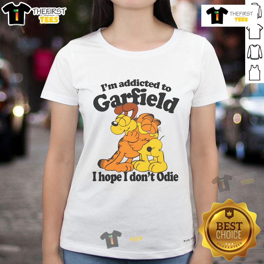 Official 'I'm Addicted to Orange Cats' ladies tee featuring a playful design with a cute orange cat illustration.