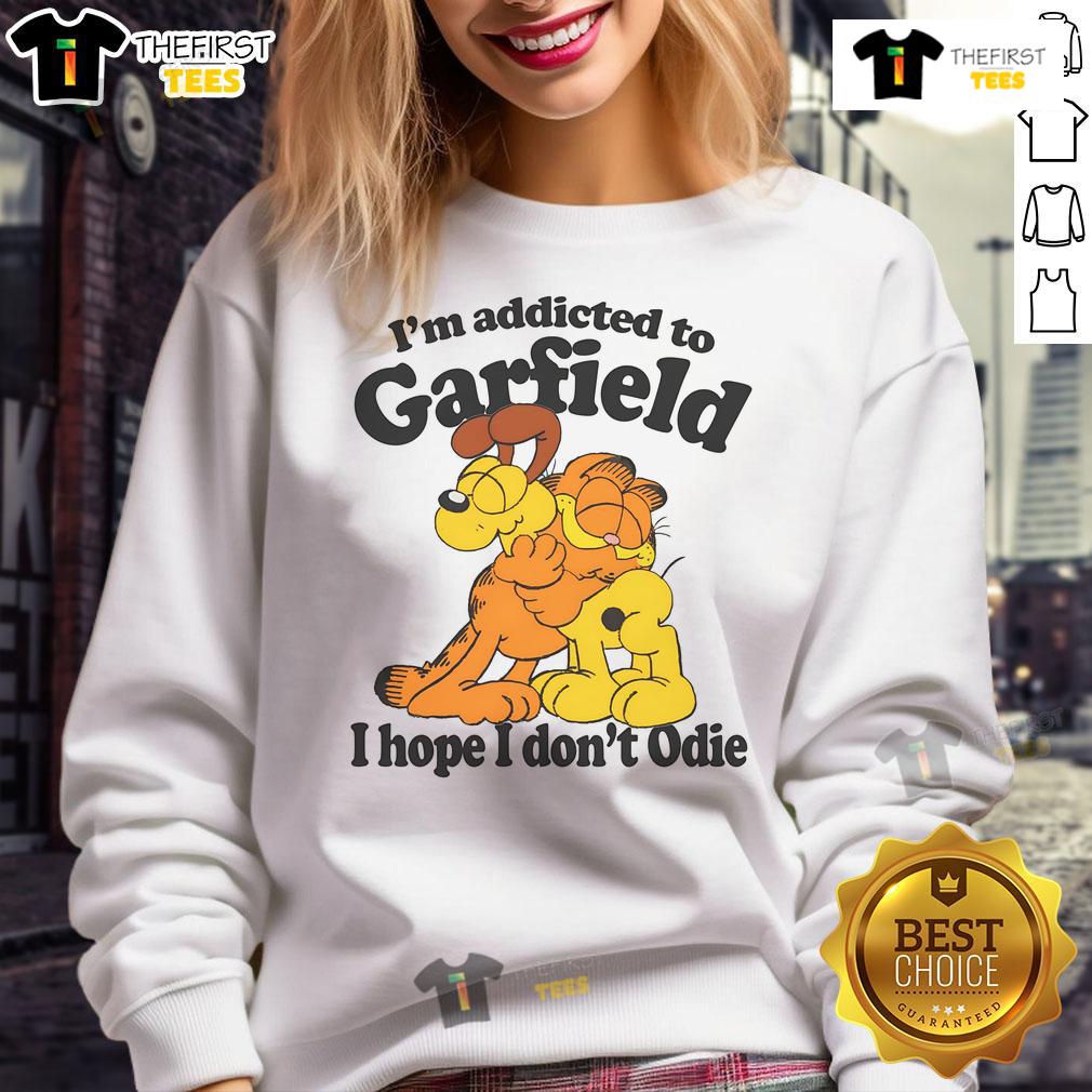 Official I'm Addicted to Orange Cat sweatshirt featuring a playful design, perfect for cat lovers and fans of Odie.