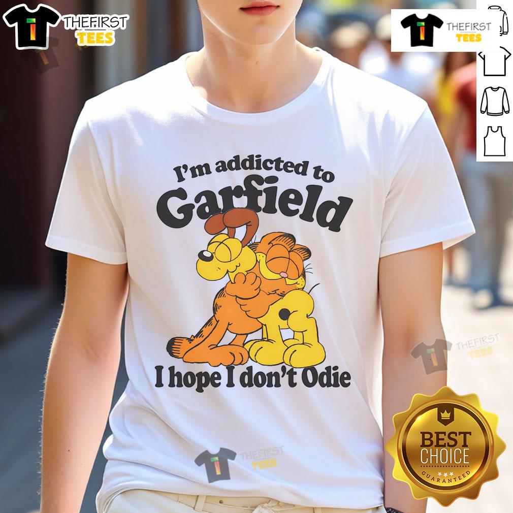 Alt Text: Official I'M Addicted To Orange Cat Hope I Don't Odie T-Shirt featuring a playful orange cat graphic and catchy slogan.