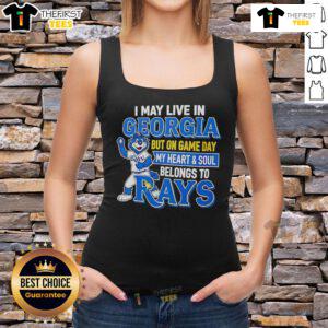 Alt Text: Woman wearing a Tampa Bay Rays tank top, showcasing pride for the team while living in Georgia on Game Day.