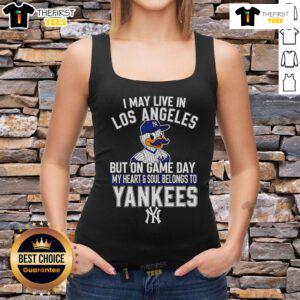 Stylish tank top featuring 'I may live in Los Angeles but my heart belongs to the New York Yankees' design.