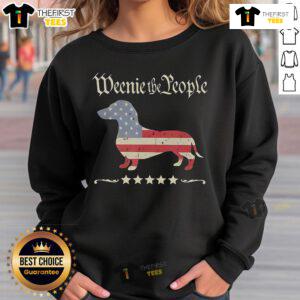 Patriotic dachshund sweatshirt featuring a cute design of a dachshund in red, white, and blue for dog lovers.