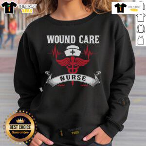 Alt Text: Awesome wound care nurse sweatshirt featuring caduceus, medical symbol, nurse hat, and heartbeat design.