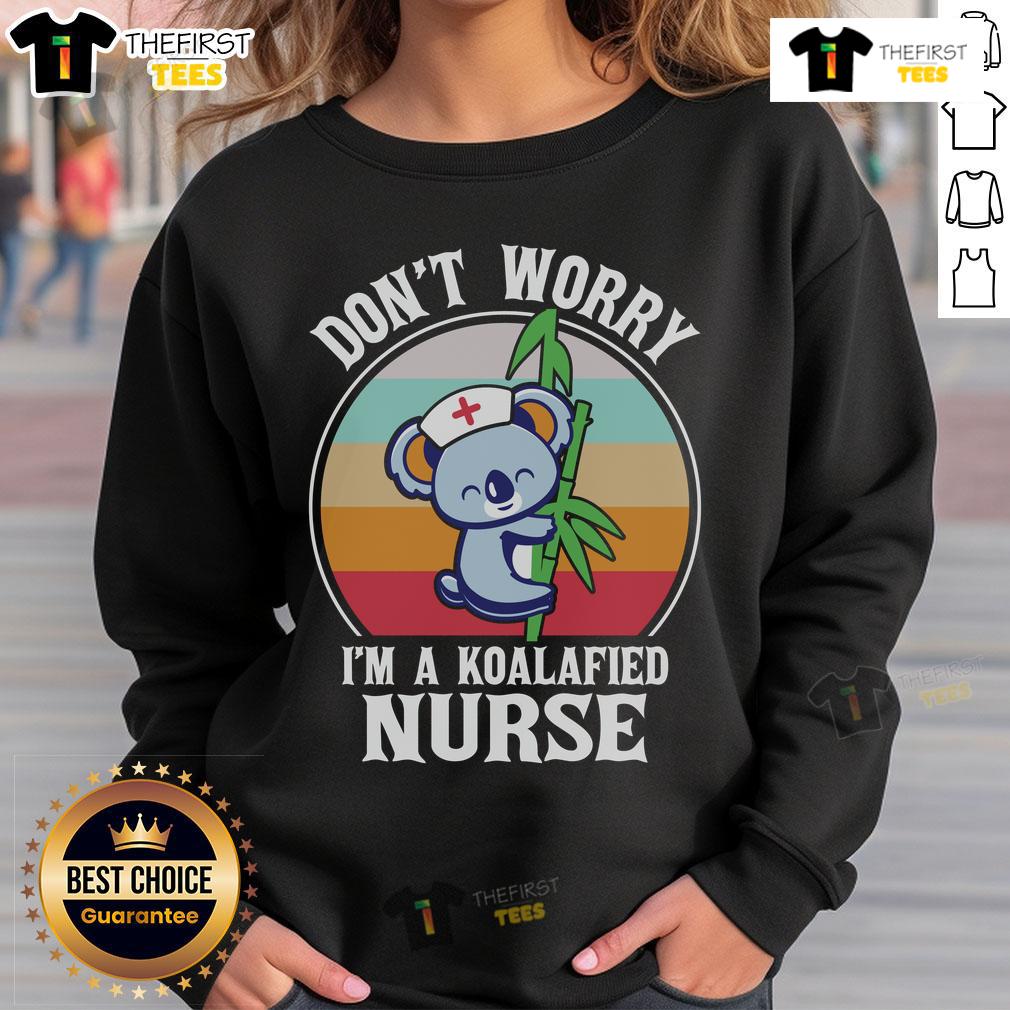 Cute 'Don't Worry I'm a Koalafied Nurse' sweatshirt featuring a playful koala design, perfect for nursing professionals.