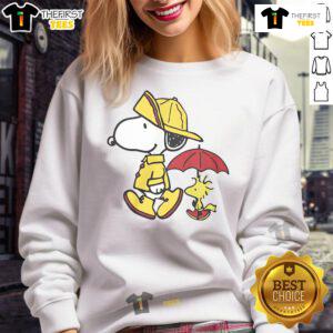 Alt Text: Cute Peanuts Snoopy and Woodstock sweatshirt perfect for rainy days, featuring vibrant colors and cozy design.