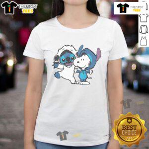 Cute Snoopy and Stitch ladies tee featuring vibrant graphics, perfect for casual wear and fans of animated characters.