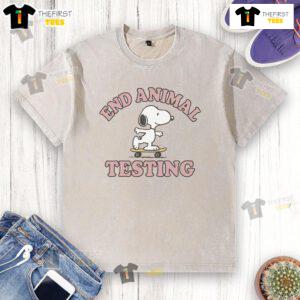 Alt Text: Cute Snoopy end animal testing graphic on a washed t-shirt promoting animal welfare and awareness.
