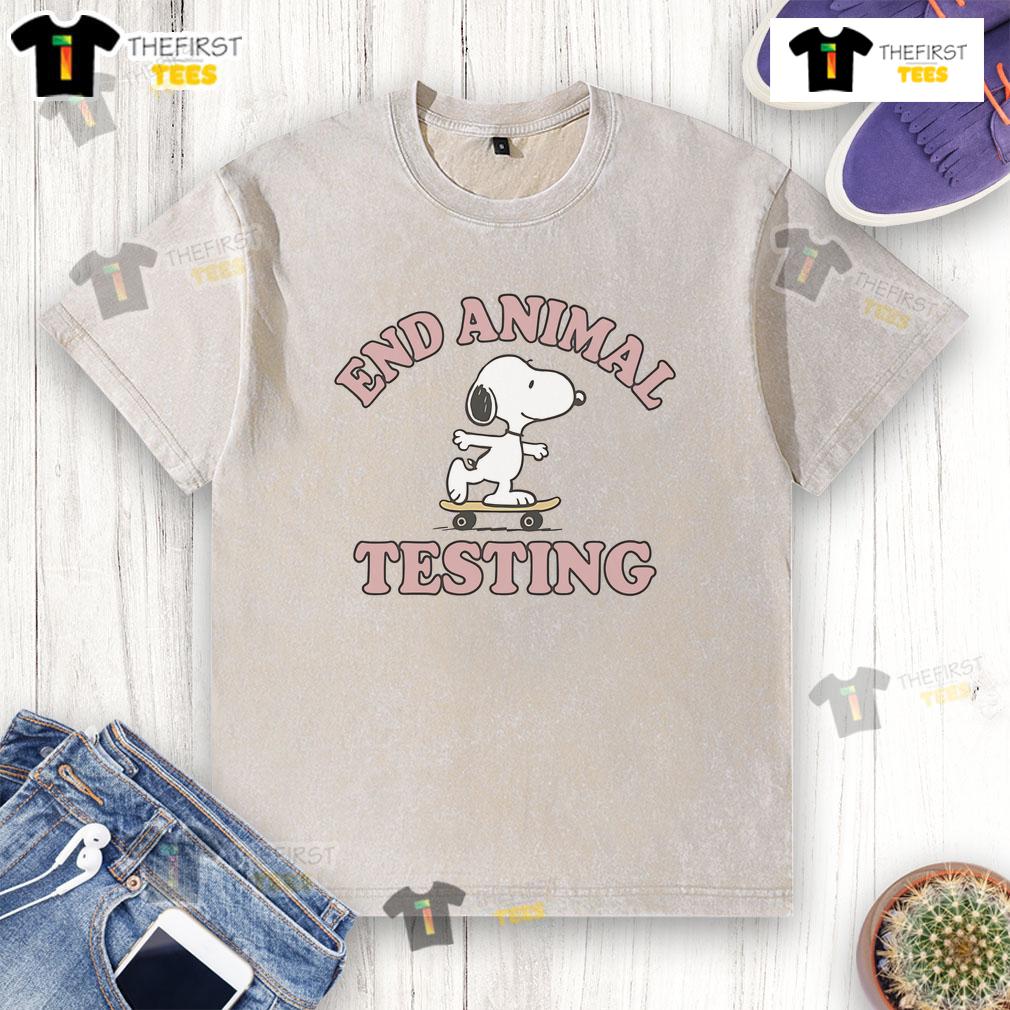 Alt Text: Cute Snoopy end animal testing graphic on a washed t-shirt promoting animal welfare and awareness.