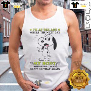 Cute Snoopy tank top with the phrase 'I'm at the age where my body whispers dont do that again' in playful font.