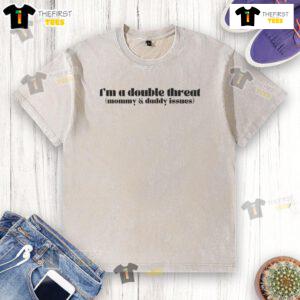 Funny I'm A Double Threat Mommy And Daddy Issues washed cotton t-shirt displayed on a hanger, perfect for casual wear.