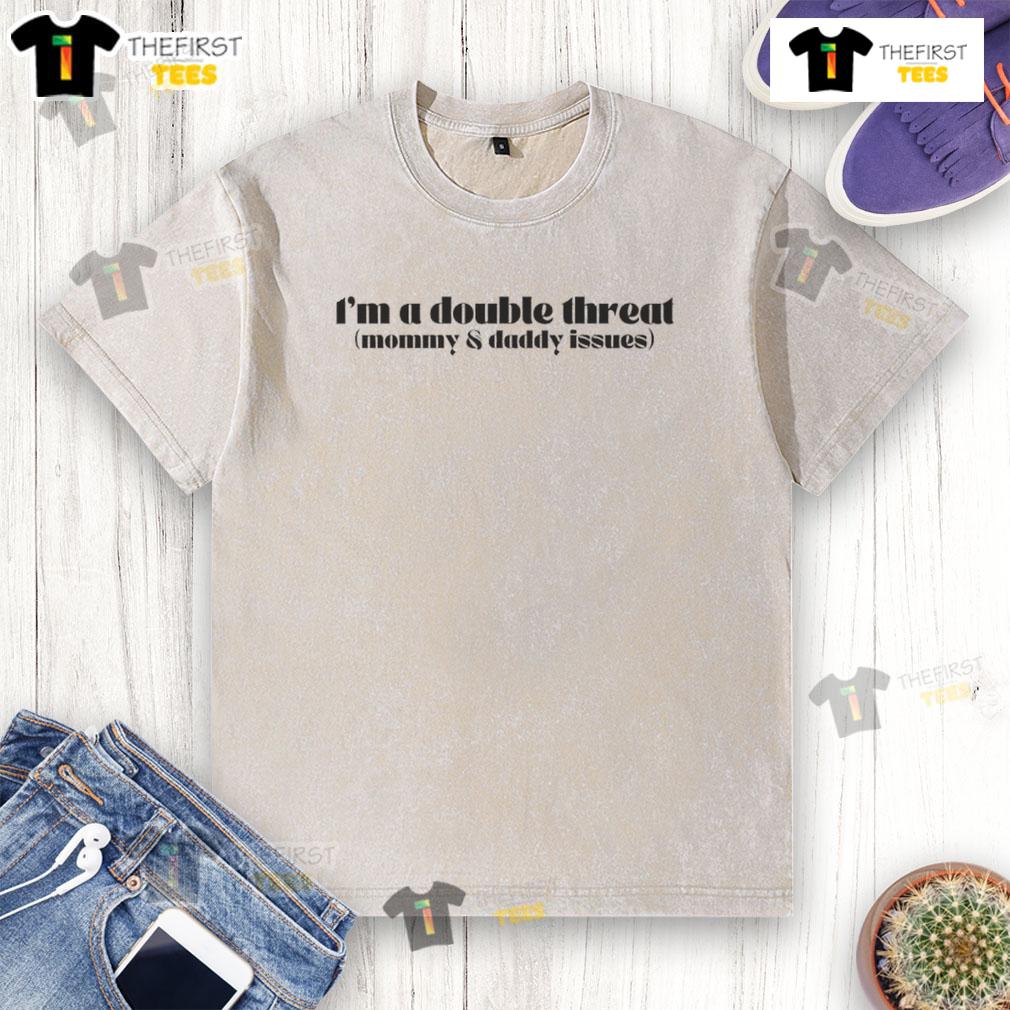 Funny I'm A Double Threat Mommy And Daddy Issues washed cotton t-shirt displayed on a hanger, perfect for casual wear.