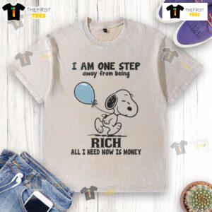 Funny Snoopy t-shirt with 'I Am One Step Away From Being Rich, All I Need Now Is Money' printed design.