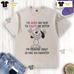 Funny Snoopy t-shirt with the quote 'I'm talking in English and you're listening in stupidity' on a casual design.