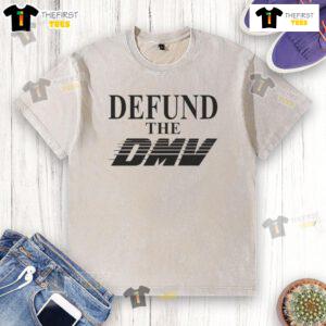 Stylish 'Defund The DMV' washed t-shirt in a casual setting, perfect for expressing your unique style and beliefs.