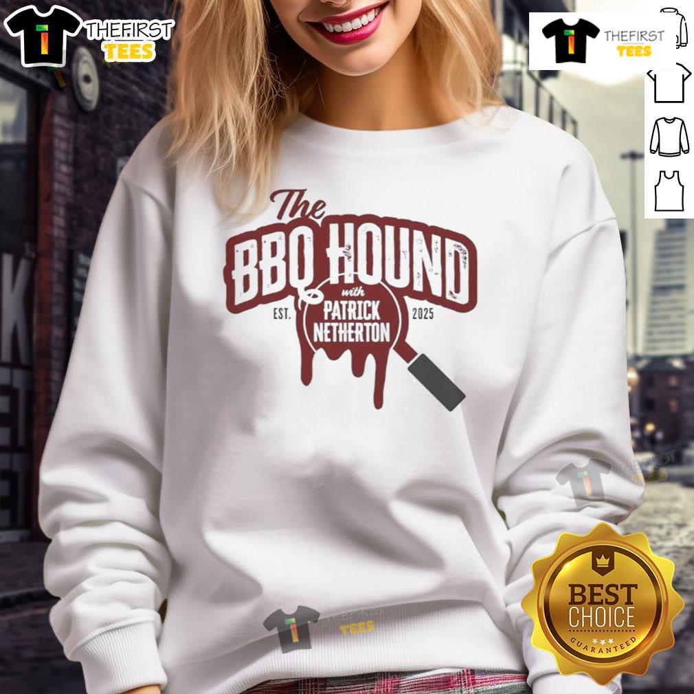 Alt Text: Nice the BBQ Hound wearing a 2025 sweatshirt with Patrick Netherton, showcasing a fun BBQ event atmosphere.