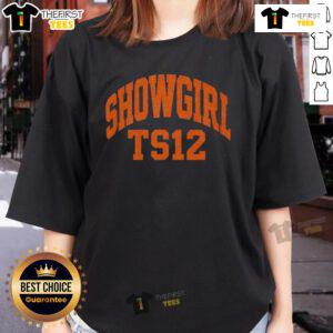 Alt Text: Official Taylor Showgirl TS121 Ladies Tee featuring stylish design and vibrant colors, perfect for fans and casual wear.