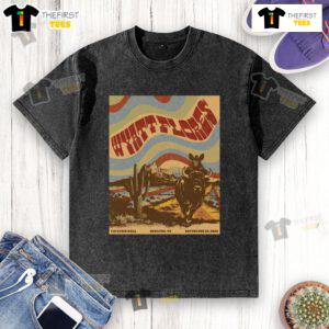 Alt Text: Official Wyatt Flores 713 Music Hall poster on a washed t-shirt, Houston, Texas, September 20, 2025.