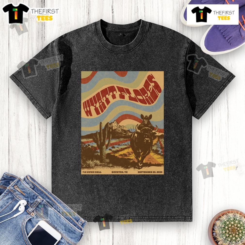 Alt Text: Official Wyatt Flores 713 Music Hall poster on a washed t-shirt, Houston, Texas, September 20, 2025.