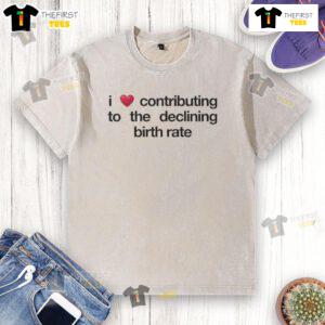 Original 'I Love Contributing to the Declining Birth Rate' washed t-shirt displayed on a wooden background.