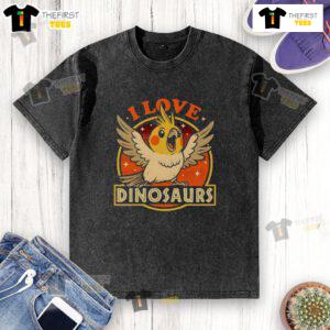Alt Text: Good Bird Love Dinosaurs washed t-shirt featuring colorful dinosaur graphics on a soft fabric background.