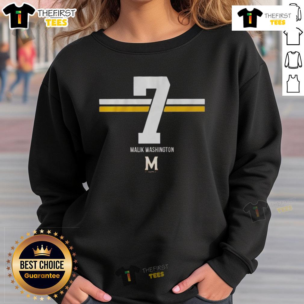 Malik Washington wearing a 7-stripe sweatshirt featuring the Maryland Terrapins football logo.