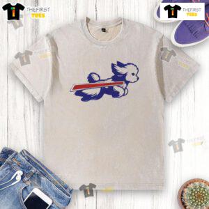 Alt Text: Cute Bichon Frise parody logo on a washed t-shirt, showcasing Buffalo Bills football spirit and humor.