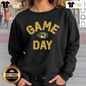 Alt Text: Official Missouri Tigers game day logo on a college sweatshirt, perfect for fans supporting their team.