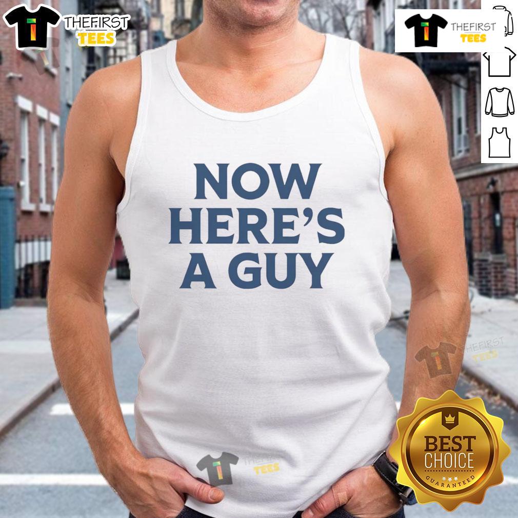 Man wearing an 'Official Now Here's A Guy' tank top, showcasing a trendy casual style perfect for summer outings.