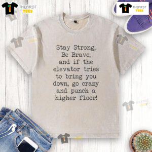 Premium Jimmy Kimmel Free Speech washed t-shirt featuring 'Stay Strong, Be Brave' slogan on a stylish design.