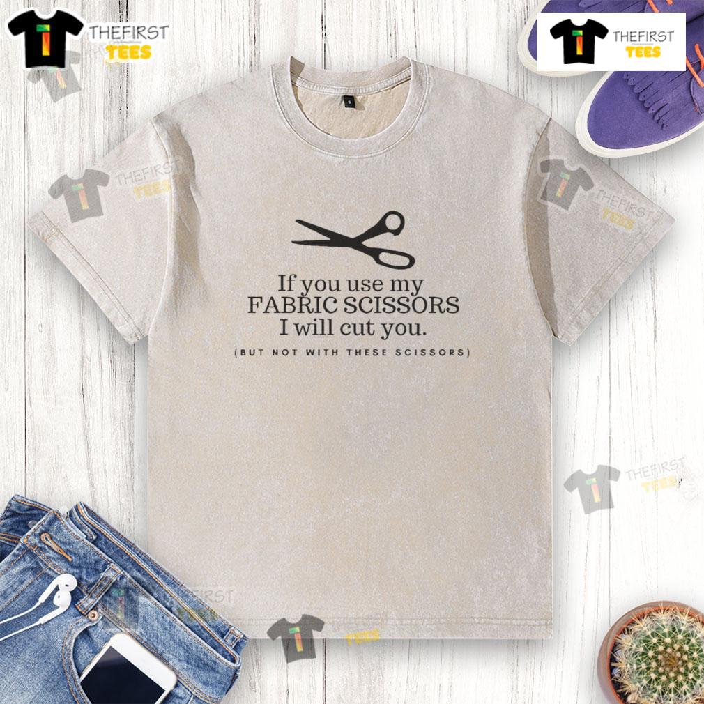 Funny washed t-shirt featuring 'Use my fabric scissors and I'll cut you' graphic, perfect for sewing enthusiasts.
