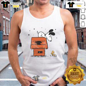 Pretty Snoopy and Woodstock in a haunted doghouse design on a stylish tank top, perfect for Halloween enthusiasts.