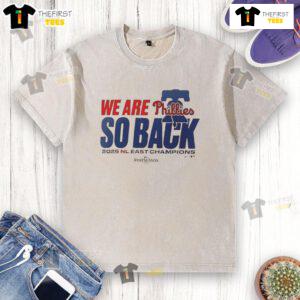 Alt Text: Top Philadelphia Phillies 'We Are So Back' 2025 NL East Division Champions washed t-shirt displayed on a neutral background.