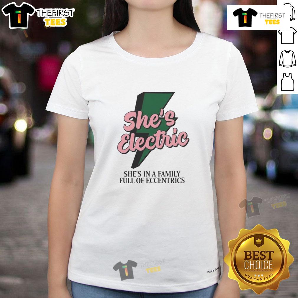Top She's Electric She's In A Family Full Of Eccentrics Ladies Tee featuring a vibrant design and playful text for women.