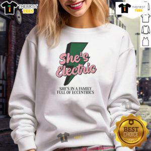 Alt Text: Top She's Electric sweatshirt featuring a quirky design, perfect for fans of eccentric family apparel.
