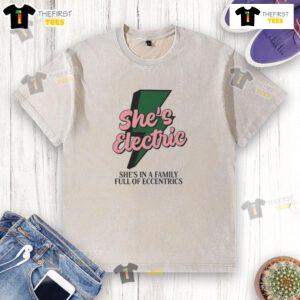 Alt Text: Top She's Electric She's in a Family Full of Eccentrics washed t-shirt featuring vibrant graphics and a relaxed fit.