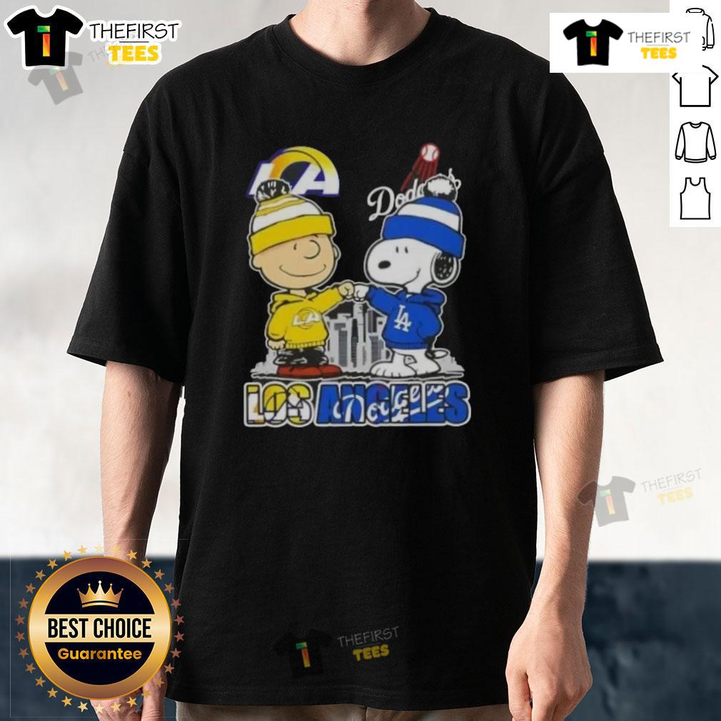 Top Snoopy and Charlie Brown Los Angeles Sports Rams X Dodgers skyline t-shirt featuring iconic cartoon characters.