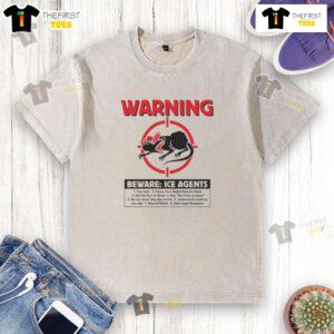 Top warning 'Beware ICE Rats' graphic on a washed t-shirt, perfect for casual wear and raising awareness about ice rats.
