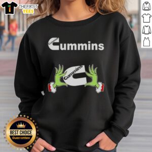 Funny Grinch hands holding a heart on a Cummins Christmas sweatshirt, perfect for festive holiday cheer.