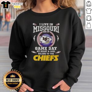 Kansas City Chiefs sweatshirt worn by a fan in Missouri, showcasing team pride on game day.