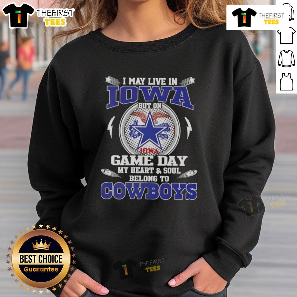Cozy sweatshirt reading 'I May Live In Iowa But On Game Day My Heart Belongs To Dallas Cowboys Football' in blue and gray.
