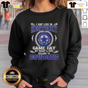 Alt Text: Cozy sweatshirt with 'I May Live In Kentucky But My Heart Belongs To Dallas Cowboys' slogan, perfect for game day.