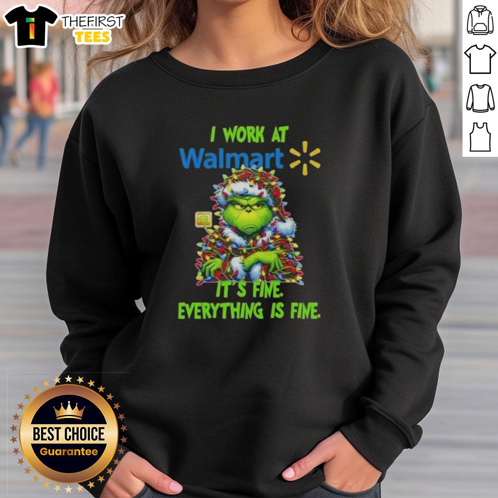 Cozy Premium Grinch Christmas Tree sweatshirt from Walmart, featuring a festive design and humorous 'It's Fine' phrase.